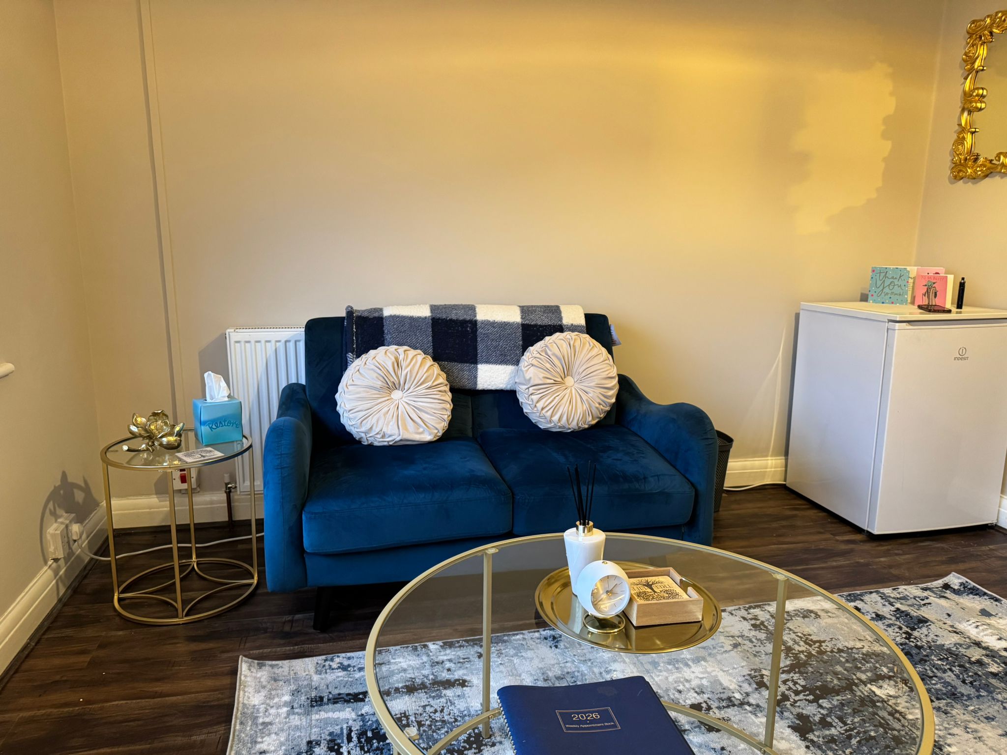 The comfortable sofa where clients sit during sessions