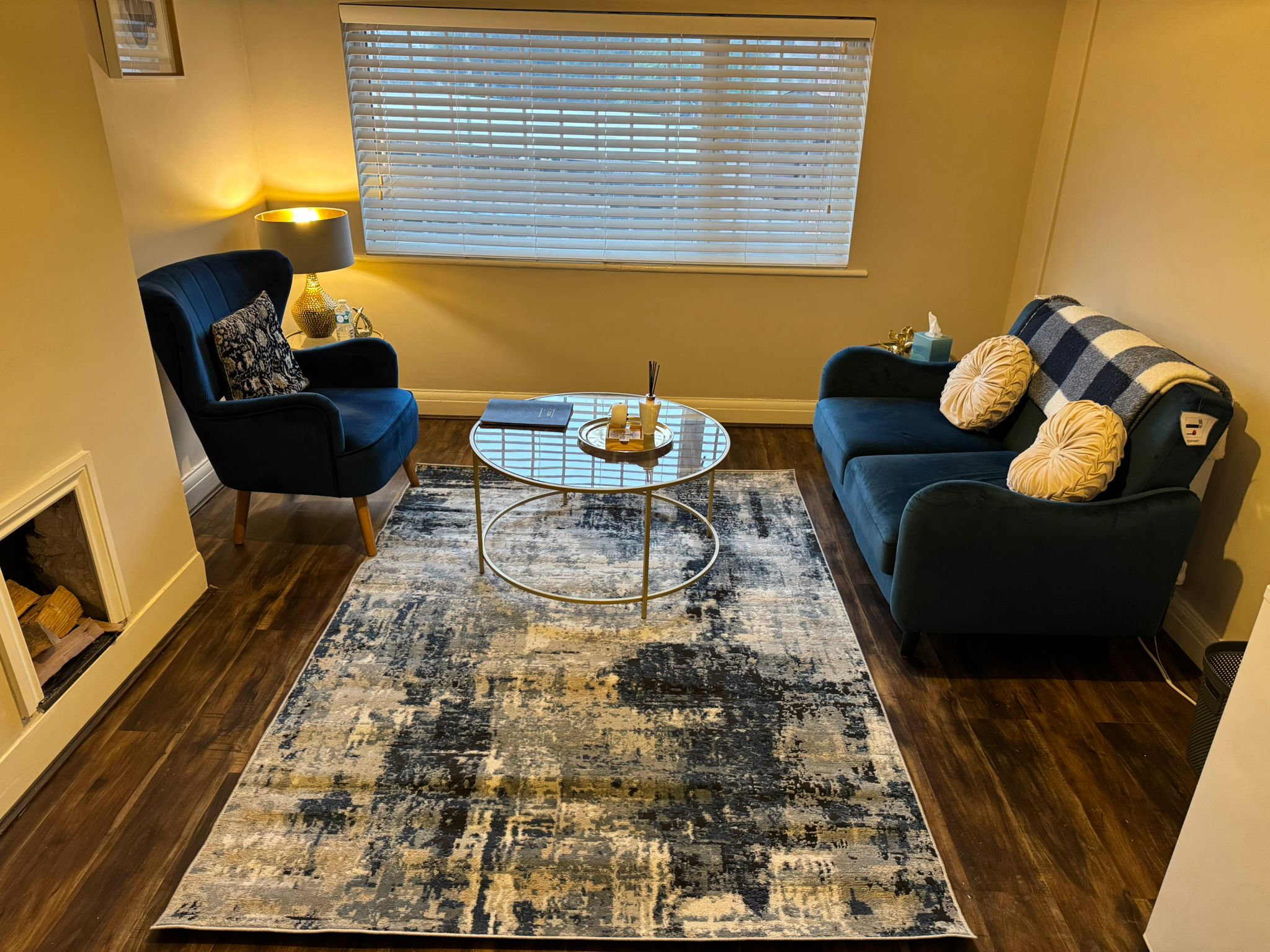 Gemma's therapy room in Solihull — comfortable seating in a warm, calming space